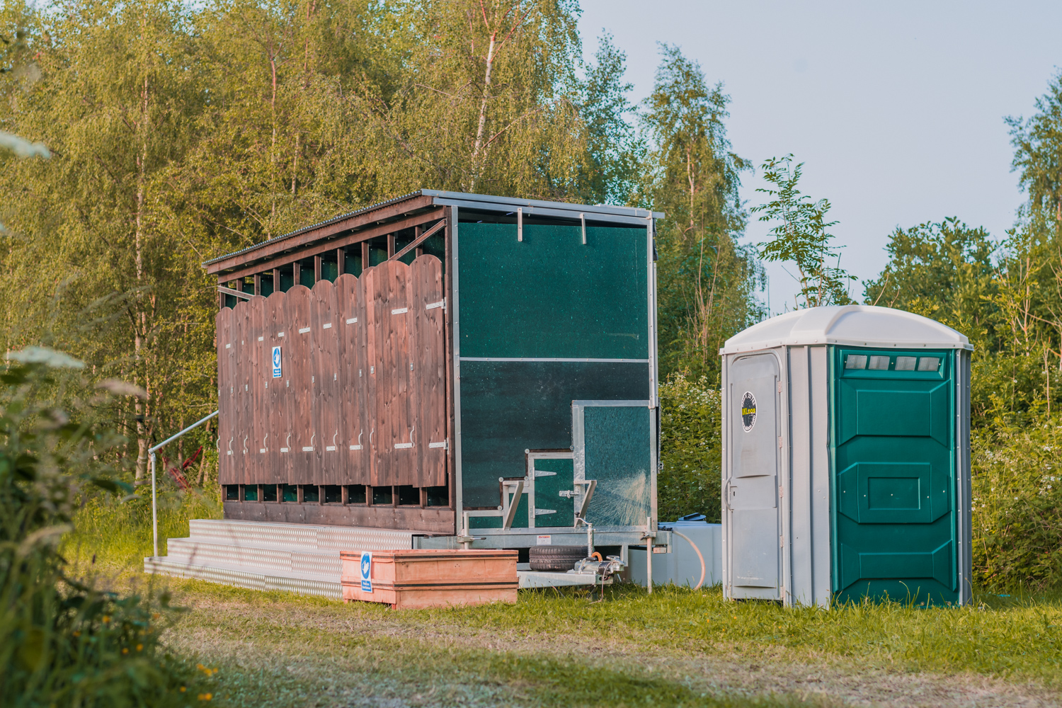 A block of compost toilets and an accessible toilet at Just So Festival.